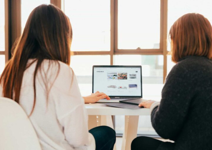 2 women examining an ecommerce website